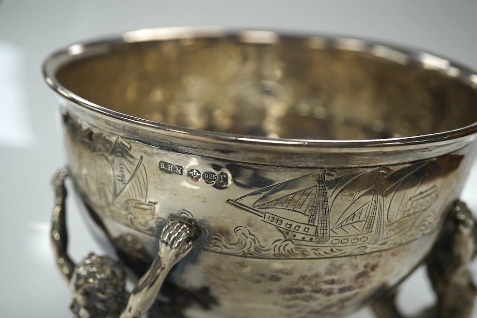 A George V Hanau silver bowl, import marks for Berthold Muller, with three Mermaid supports, London, 1912, diameter 13cm, 11.8oz. Condition - poor